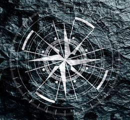 Brochure or report design element. Travel and discovery relative image. Compass symbol on geometry pattern. Stone material