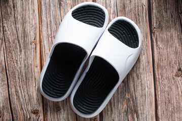 pair of shoes on wooden floor