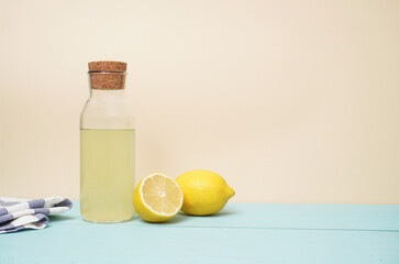 Lemonade or mojito cocktail with lemon and mint, cold refreshing drink or beverage with ice. Copy space for your text