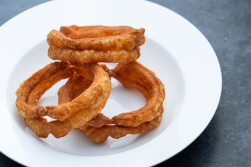 Traditional food jiaoquan in old Beijing of China. Old Beijing specialty food jiaoquan. Fried doughnut, a traditional snack in Beijing.