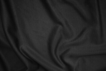 Background texture black cloth. Abstract dark wavy soft. Fabric is wrinkled. Fashion luxury style.