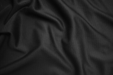 Fototapeta premium Background texture black cloth. Abstract dark wavy soft. Fabric is wrinkled. Fashion luxury style.