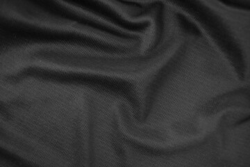 Fototapeta premium Background texture black cloth. Abstract dark wavy soft. Fabric is wrinkled. Fashion luxury style.