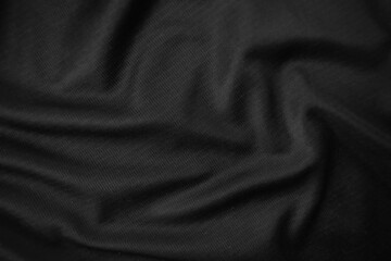 Background texture black cloth. Abstract dark wavy soft. Fabric is wrinkled. Fashion luxury style.