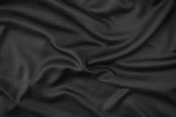 Background texture black cloth. Abstract dark wavy soft. Fabric is wrinkled. Fashion luxury style.