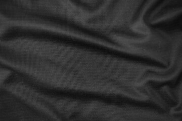 Fototapeta premium Background texture black cloth. Abstract dark wavy soft. Fabric is wrinkled. Fashion luxury style.