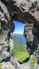 Trenches of the First World War at the Italian Alps. Cadorna line. San Marco Pass, Bergamo. Openings in the rock overlooking the Alps towards the Swiss border