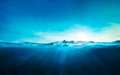 blue ocean underwater , deep ocean, blue water waves with sun beam clear view realistic, world...