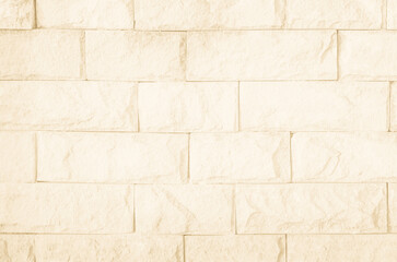 Brown brick wall texture background in room at subway. Brickwork stonework interior, rock old clean concrete grid uneven abstract weathered bricks tile design, horizontal architecture wallpaper.