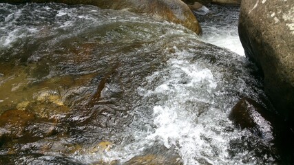 water flowing over rocks