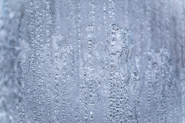 Splashes of water against light background.