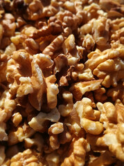 Group of nuts in the foreground. Dried fruits without skin. Natural peeled fruit. Walnut kernels skinless.