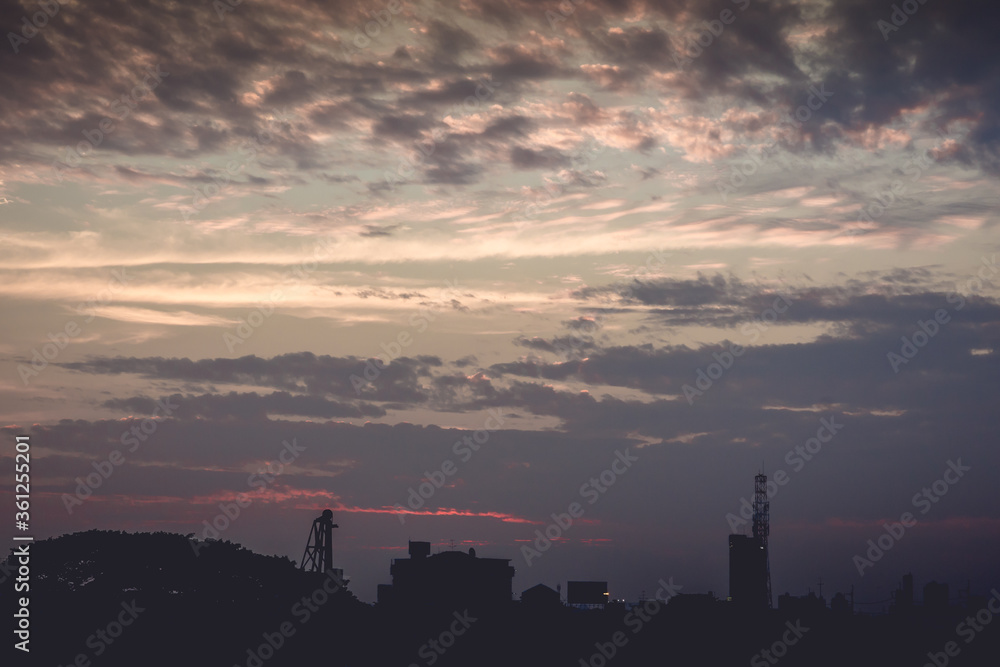 Poster sunset with clouds and light rays other atmospheric effect for use as a background image