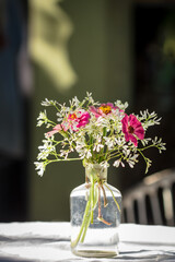 vase of various types of flowers in Vintage Style outdoor Living