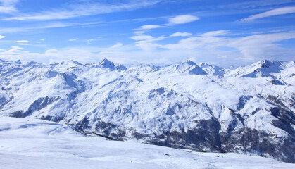Plakat Panoramic view of the mountains of France on a winter sunny day. Haute Savoy, France. Snow Park.