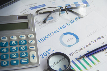 Business finance analysis for solutions concept pen charts and graphs magnifier glass
