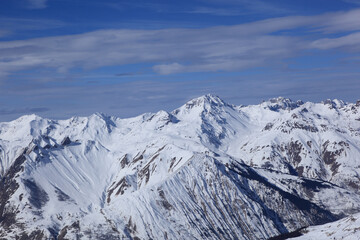 Obraz premium Panoramic view of the mountains of France on a winter sunny day. Haute Savoy, France. Snow Park.
