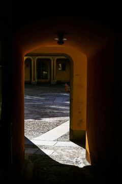 Stockholm, Sweden June 29, 2020 A small alley and arch in Old Town or Gamla Stan called Klockgjutargrand leading to Brantingtorget.