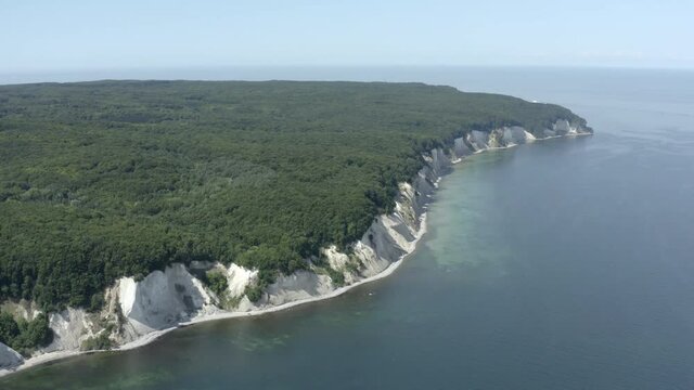 Drone Aerial Shot of the chalk cliffs on Ruegen R&uuml;gen in Germany in beautiful light with green and blue seawater, Europe