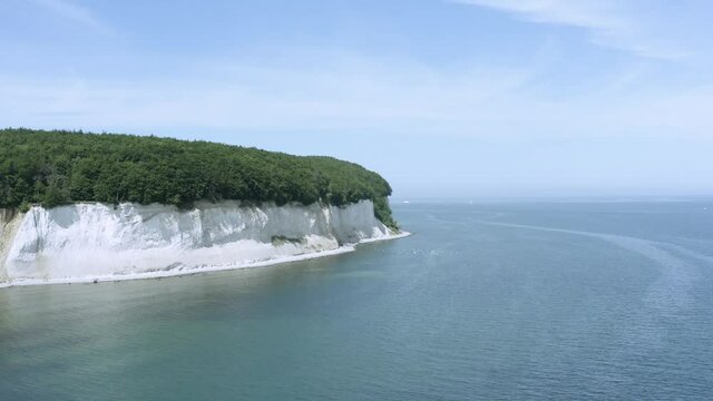 Drone Aerial Shot of the chalk cliffs on Ruegen R&uuml;gen in Germany in beautiful light with green and blue seawater, Europe