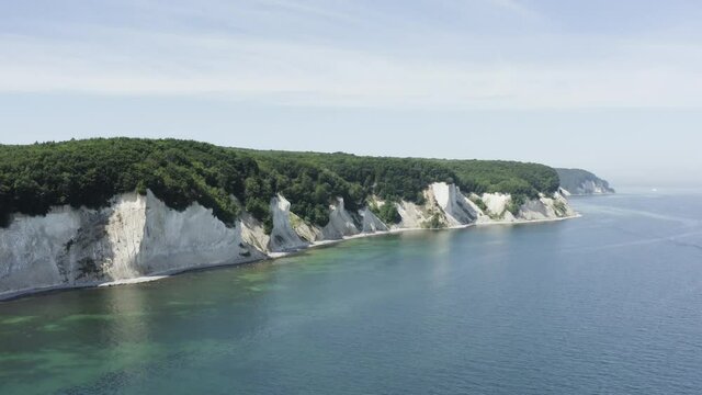 Drone Aerial Shot of the chalk cliffs on Ruegen R&uuml;gen in Germany in beautiful light with green and blue seawater, Europe