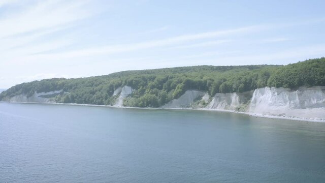 Drone Aerial Shot of the chalk cliffs on Ruegen R&uuml;gen in Germany in beautiful light with green and blue seawater, Europe