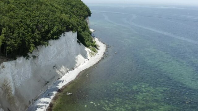 Drone Aerial Shot of the chalk cliffs on Ruegen R&uuml;gen in Germany in beautiful light with green and blue seawater, Europe