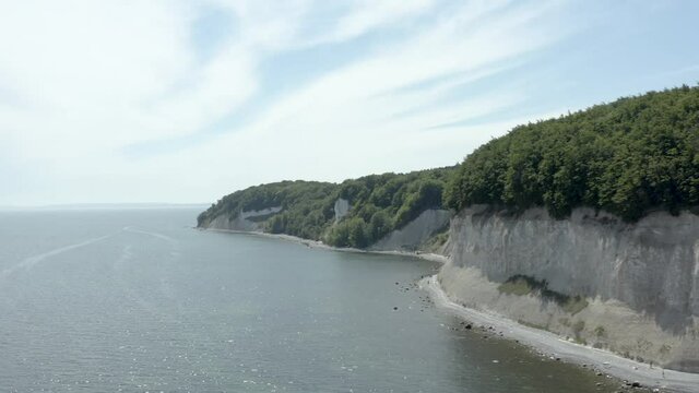 Drone Aerial Shot of the chalk cliffs on Ruegen R&uuml;gen in Germany in beautiful light with green and blue seawater, Europe