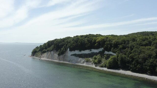 Drone Aerial Shot of the chalk cliffs on Ruegen R&uuml;gen in Germany in beautiful light with green and blue seawater, Europe