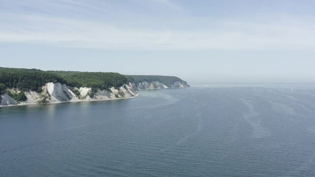 Drone Aerial Shot of the chalk cliffs on Ruegen R&uuml;gen in Germany in beautiful light with green and blue seawater, Europe