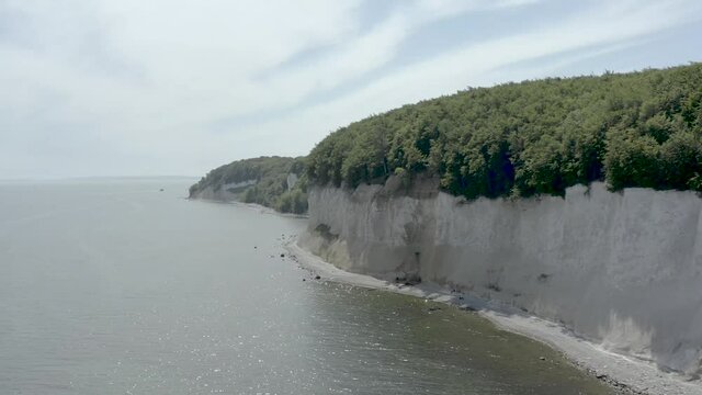 Drone Aerial Shot of the chalk cliffs on Ruegen R&uuml;gen in Germany in beautiful light with green and blue seawater, Europe