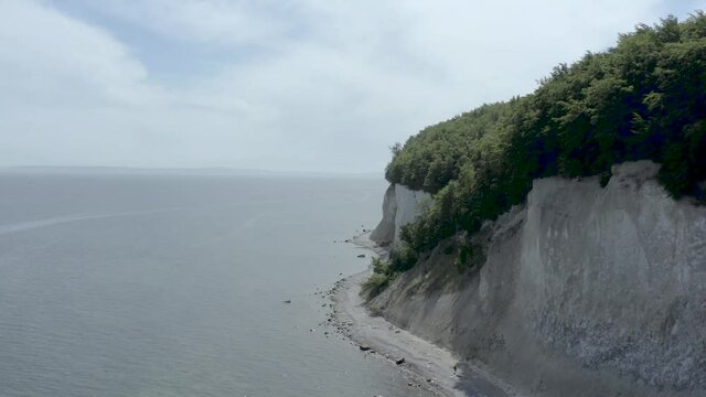Drone Aerial Shot of the chalk cliffs on Ruegen R&uuml;gen in Germany in beautiful light with green and blue seawater, Europe