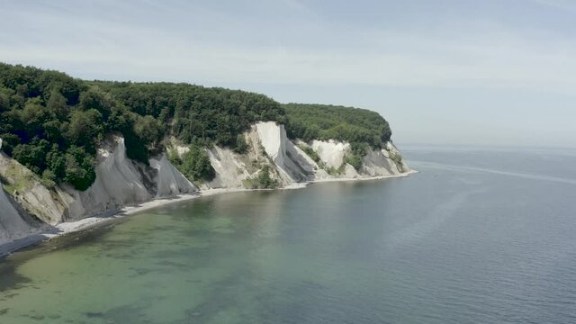 Drone Aerial Shot of the chalk cliffs on Ruegen R&uuml;gen in Germany in beautiful light with green and blue seawater, Europe