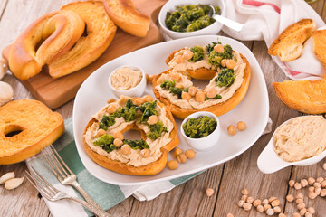 Friselle with turnip tops and hummus.
