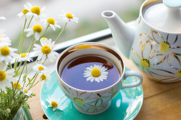 herbal chamomile tea, tea from flowers and herbs, vintage style