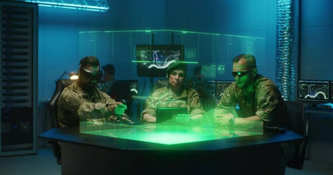 Soldiers remote controlling combat drone