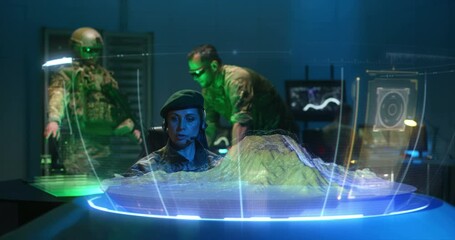Soldiers discussing holographic landscape display
