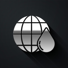 Silver Earth planet in water drop icon isolated on black background. World globe. Saving water and world environmental protection. Long shadow style. Vector Illustration.