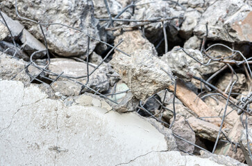 Destroyed concrete slab with many cracks.