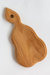 handmade wooden cutting board isolated on white background, top view