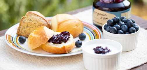 Blueberry jam and scorn with yoghurt