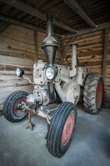old tractor in a farm barn