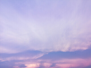 Sky and cloudy with beautiful purple color background.Subtle background Pastel of cloud.