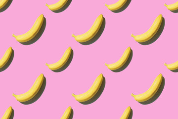 Fototapeta na wymiar Banana pattern with shadow on pink background