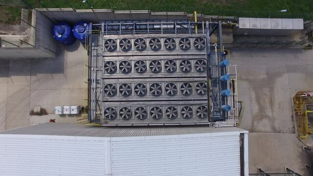 Flying over the roof of a power plant