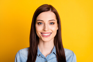 Close up photo of friendly optimistic nice girl look in camera enjoy summer weekend wear denim jeans shirt isolated over vibrant color background