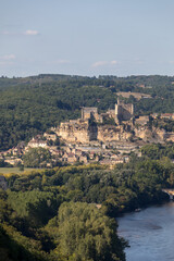 Fototapeta na wymiar The medieval Chateau de Beynac rising on a limestone cliff above the Dordogne River seen from Castelnaud. France, Dordogne department, Beynac-et-Cazenac