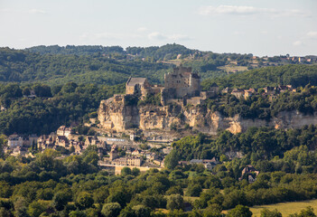 Obraz premium The medieval Chateau de Beynac rising on a limestone cliff above the Dordogne River. France, Dordogne department, Beynac-et-Cazenac