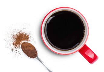 Close-up red cup of black coffee and   instant coffee powder in stainless teaspoon isolated on white background. Top view. Flat lay.