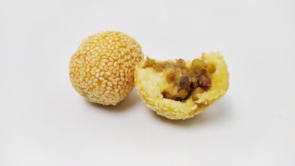 Indonesian tradisional food onde onde or sesame ball with mung bean filling isolated on white background